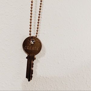 “Create” key necklace